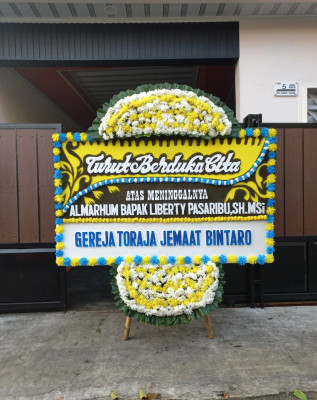 Papan Bunga Duka di Bendungan Hilir