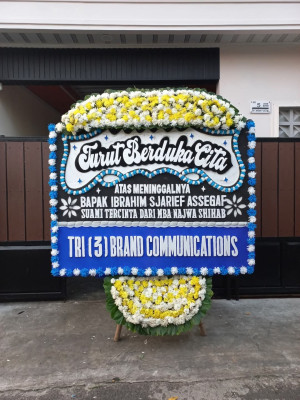 Papan Bunga Duka di Bendungan Hilir